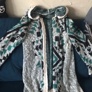 Long, Aztec print hooded sweater w/ tassels